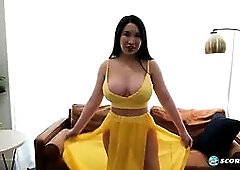 Suki Sin is built thick, with huge tits and a nice big ass. She toys her Asian pussy with a big dildo.