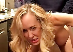 Great looking blonde got down on her knees and sucked her lover's cock, like a real pro