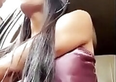 he is a very horny shemale wanking it in the car and cuming