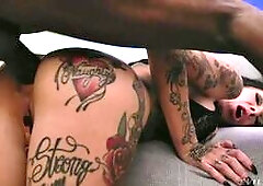 Busty, tattooed Romanian beauty Megan Inky flaunts her bodacious body in tight lingerie, teasing and stripping. The outrageous vixen pumps a massive d