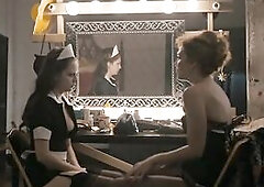 Maggie Gyllenhaal wearing underware and nylons caresses a woman's tits and talks obscene previous to getting bare and screwed.