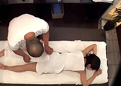 Luscious Asian babes sexually satisfied on a massage table