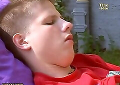 Handsome 18 year old blond boy with big cock in the lawn jerks off and cums