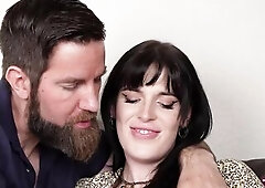 A gorgeous trans woman with shoulder-length ebony hair enjoys ardent sex with a hunk partner in various poses including missionary and spooning.