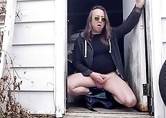 Wanking outside and licking the cum from my hand