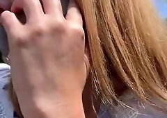 Blonde Babe Flirts in City Park