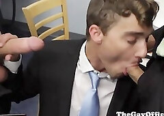 Office twink spitroasted by two suited hunks