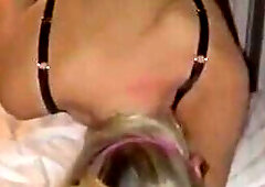 A daring amateur video where a bold blonde GF is blindfolded and shared by her partner, a cuckold husband, with a BCC, all captured for an exciting an