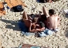 4 Guys Playing On Nude Beach