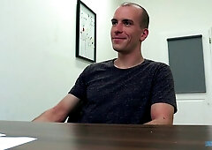 Bald newcomer riding cock bareback in a casting porn video