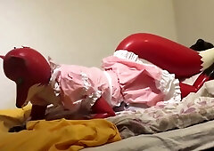 Rubber fox maid plays with beach ball