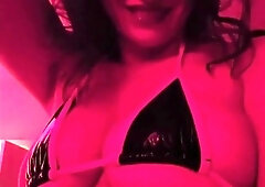 Pink Lights Miss Kitty Teases In Bikini