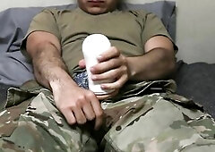 Soldier uses a fleshlight and creampies it