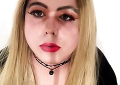 Blond sissy smokes a cigarette and plays with knob in chastity