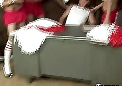 Big dick shemale cheerleaders take turn plowing a bottom dude