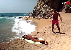 Topless Black Playgirl Oiled Up on the Beach... His Hands Slip Below Her Bikini