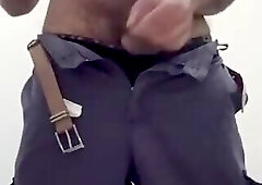 A muscular black security guard is having sex in a public restroom at the mall.