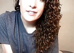 Curly haired sexy tgirl gets handjob and cums