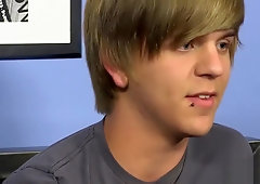 Good looking twinkie strokes his dick after giving interview