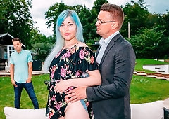 Blue-haired chick Misha Mayfair is serving two dicks in the garden