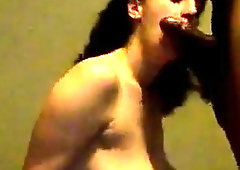 Huge Busty sucking a black cock