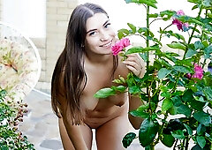 Sweet outdoor masturbation with a long-legged brunette Elise Moon