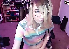 slim teen femboy in glasses tugs her big dick on webcam