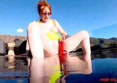Red Xxx - Fucks Her Pussy With A Toy In The Pool