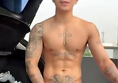 Asian guy wanking outdoors