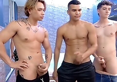 Latino buddies having fun in the bathroom on cam