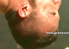 Gay bondage ritual with strong slave