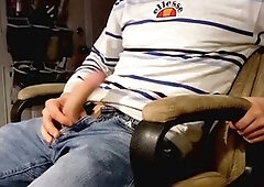 College jock strokes his uncut cock while hitting the books