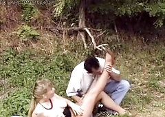 Breasty Blond Sucks Ramrod Outdoors in Amateur Shoot