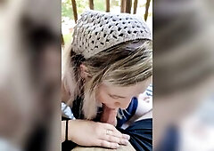 Golden-haired playgirl gives head on the patio