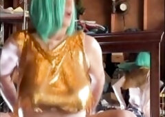 Hawt transsexual in gold chaimail top lets her bazookas bounce whilst riding her sex toy. 2 views show the joy from in front and above to enslave her 