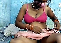 Indian aunty has fun with her young tamil girl in the bedroom
