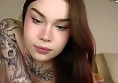 slender tattooed tgirl with tattoos and small cock shows off her hot body on webcam