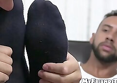 Gay black amateur wanks off while a business man licks his feet