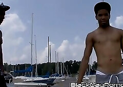 Dallas Knight and Thugzilla show off their mighty fine bods while driving on a boat