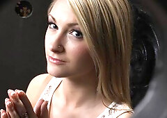 Big-boobed blonde Chloe Addison gives a blowjob in the gloryhole
