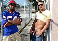 Public gay fucking by the fence, featuring Malek Steel and Kenton
