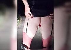 I was clothed and with plug and cage and the S-cup bazookas outdoors