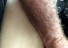 Mature guy giving a twink head inside the car