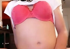 Having naughty fun with sex toys in the living room