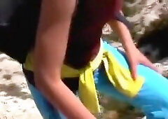 A barefaced golden-haired goes undressed outside in public