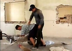 Old concierge with large bazookas screwed outdoor