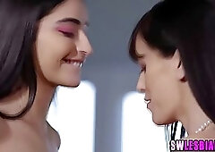 Cute teen brunette and her smoking hot step- mommy are eating each other up, on the couch