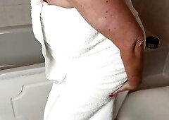 Mrs Aged Feet getting clothed after her morning shower in a very hot Red Brassiere and Panties set previous to putting on her ebony hold up nylons.