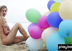 Tiny stripped blondie enjoying the summer at the beach