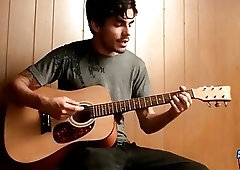 Talented twink plays the guitar before stroking his hard cock